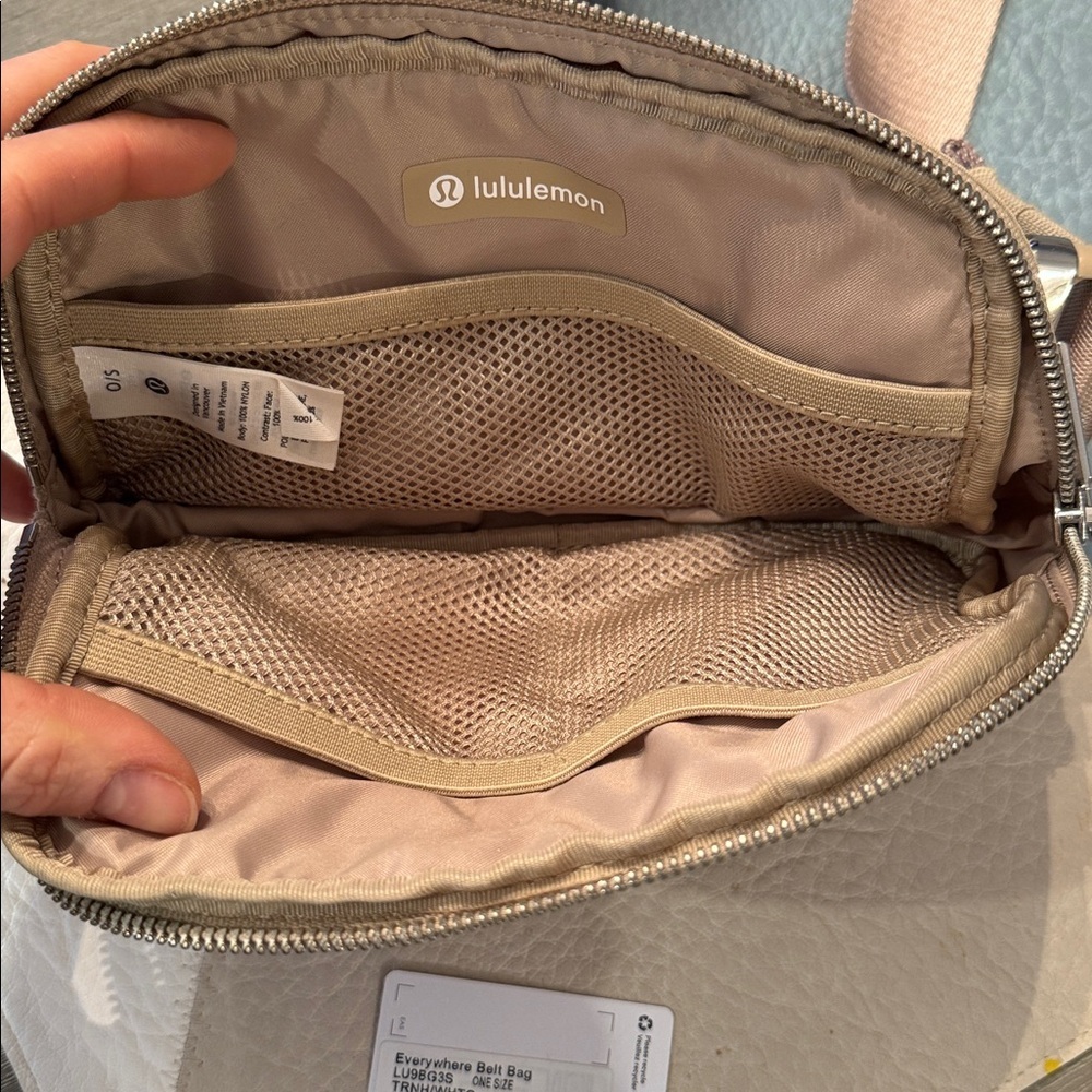 lululemon Everywhere Belt Bag 1L with a raised logo in the Trench/White Opal - Picture 3 of 4